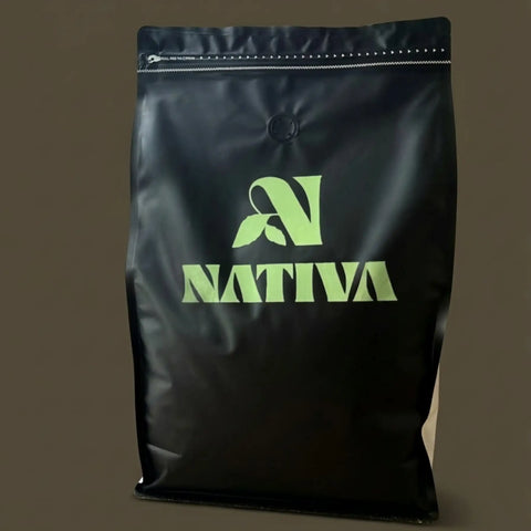 Black 2.5kg coffee bag with green 'Nativa' logo on a dark background