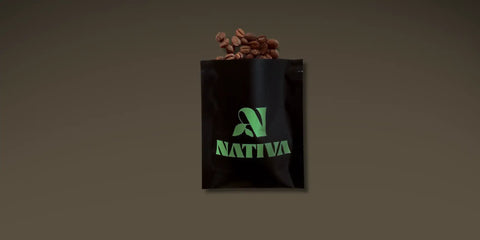 Black bag with 'Nativa' logo and brown coffee beans on a dark background