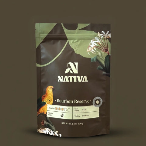 Nativa Bourbon Reserve coffee bag with a parrot illustration on a dark background