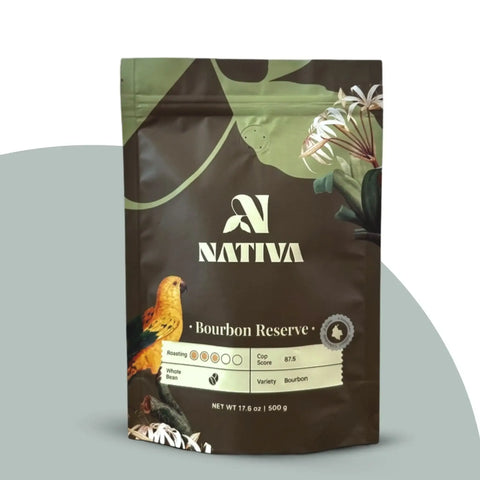 Nativa Bourbon Reserve coffee bag with a parrot illustration on a blue background