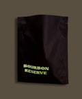 Sample dark packaging with 'Bourbon Reserve' text on a brown background