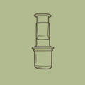 Aeropress coffee accessory on a green background