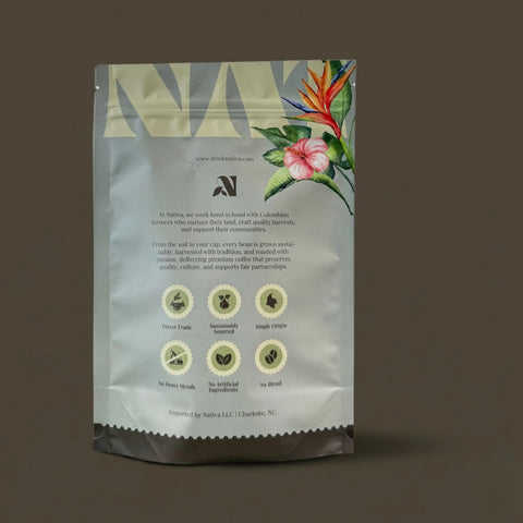 Mountain Peak Coffee bag with floral design and brand logo on a dark background