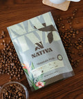 Nativa coffee package with coffee beans on a wooden surface
