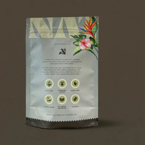 Mountain Peak Coffee bag with floral design and brand logo on a dark background