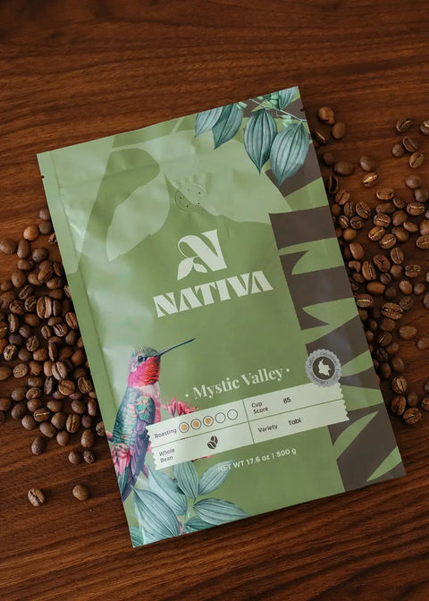 Nativa coffee package with coffee beans on a wooden surface