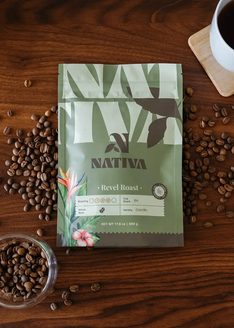 Nativa coffee package on a wooden surface with coffee beans