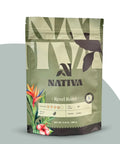 Nativa coffee Revel Roast bag with floral designs on a gray background