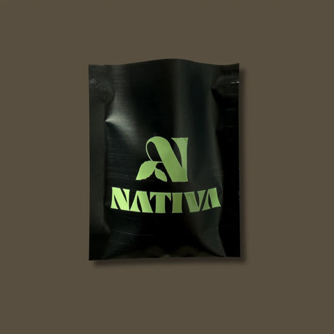 Sample black package with green 'Nativa' logo on a brown background