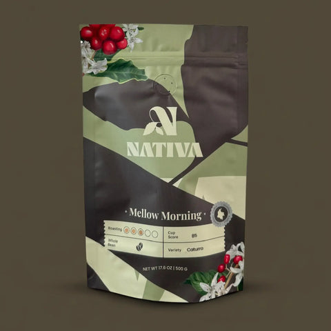 Nativa Mellow Morning coffee package with coffee beans and leaves on a dark background